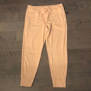 Medium light pink jogger pants from Jaanuu. Brand new with tag!!